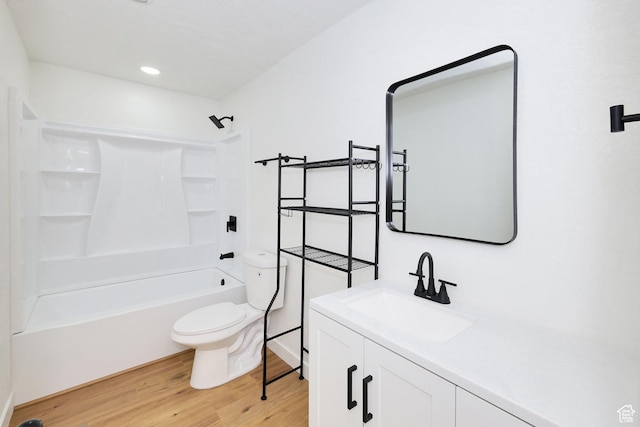 4673 W 5255 S, Kearns, UT 84118 - bathroom with vanity, toilet, wood finished floors, and shower / bath combination