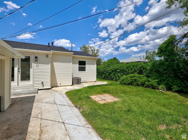 4673 W 5255 S, Kearns, UT 84118 - view of grassy yard with central AC unit