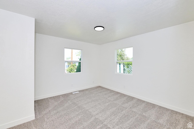 4673 W 5255 S, Kearns, UT 84118 - carpeted empty room with plenty of natural light and baseboards
