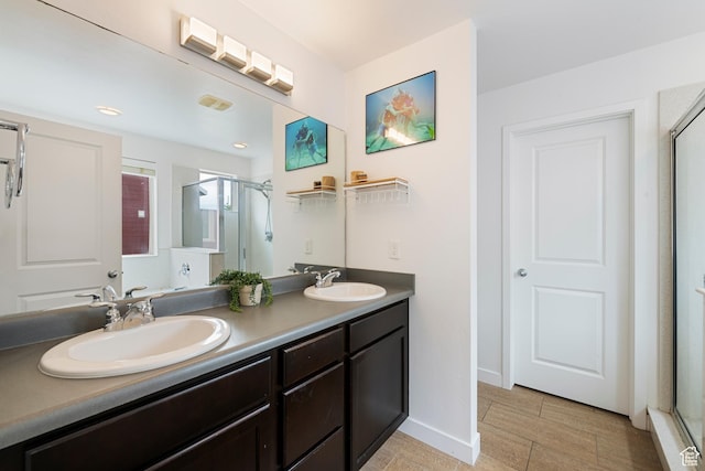 841 W Cannara Way S, Midvale, UT 84047 - bathroom with a stall shower, double vanity, and baseboards