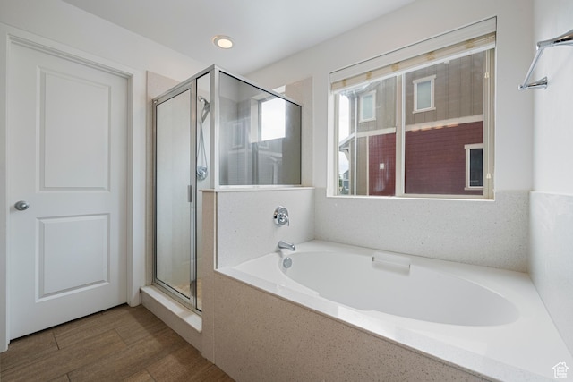 841 W Cannara Way S, Midvale, UT 84047 - bathroom with a stall shower, a garden tub, and wood finished floors