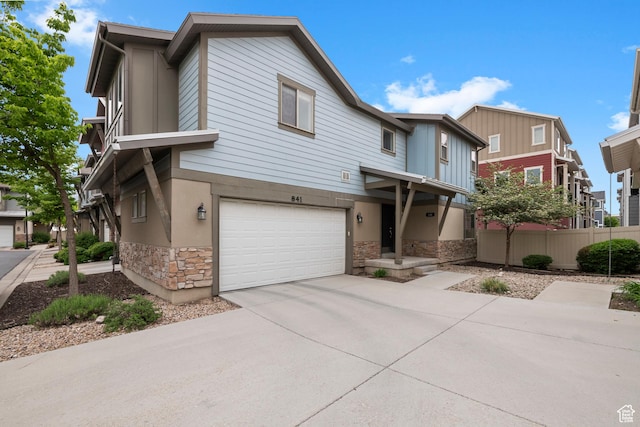 841 W Cannara Way S, Midvale, UT 84047 - multi unit property featuring stone siding, driveway, and a garage