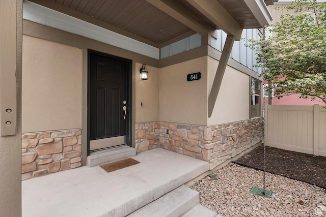 841 W Cannara Way S, Midvale, UT 84047 - doorway to property with stone siding and stucco siding