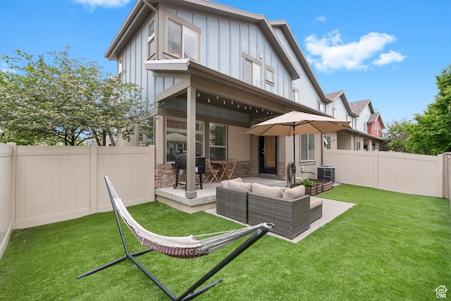 841 W Cannara Way S, Midvale, UT 84047 - rear view of property with board and batten siding, a patio, outdoor lounge area, central AC unit, and stone siding