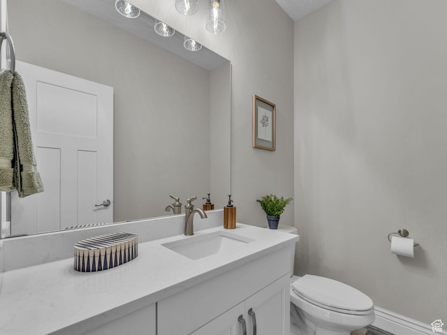 1949 W Shadow Way, Kaysville, UT 84037 - bathroom featuring toilet, vanity, and baseboards
