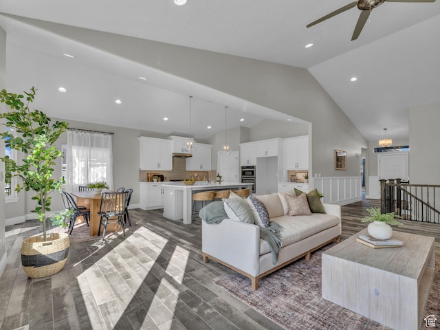 1949 W Shadow Way, Kaysville, UT 84037 - living area featuring high vaulted ceiling, wood finished floors, ceiling fan, and recessed lighting