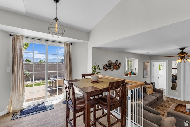 6169 Longmore Dr, Salt Lake City, UT 84118 - dining room featuring light wood-type flooring, baseboards, and ceiling fan