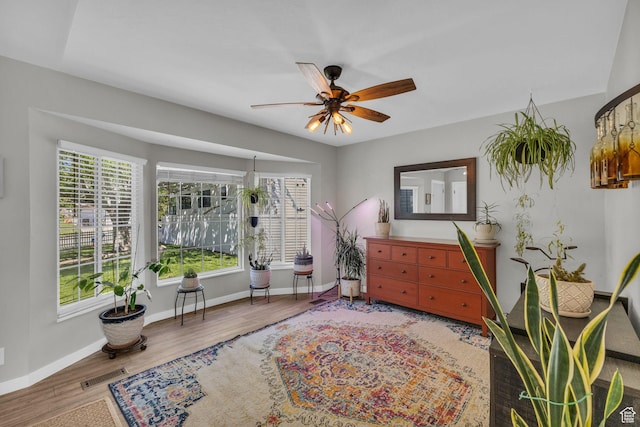 6169 Longmore Dr, Salt Lake City, UT 84118 - living area with ceiling fan, baseboards, and wood finished floors
