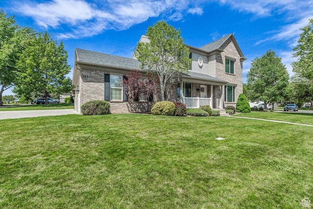 441 E Crape Myrtle Cir, Draper, UT 84020 - traditional-style house with covered porch, brick siding, and a front lawn