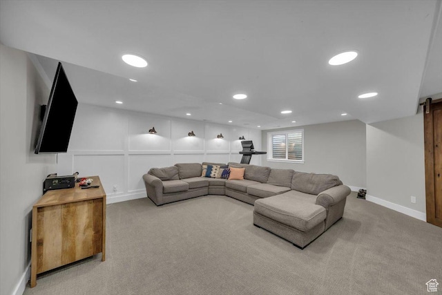 441 E Crape Myrtle Cir, Draper, UT 84020 - carpeted living area featuring recessed lighting, baseboards, a barn door, and a decorative wall