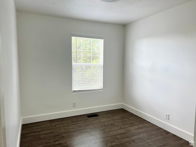 376 E 770 N, Tooele, UT 84074 - unfurnished room featuring dark wood-type flooring and baseboards