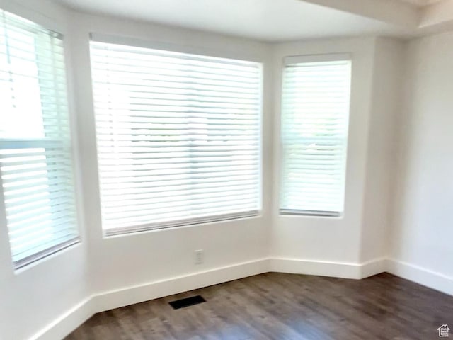 376 E 770 N, Tooele, UT 84074 - spare room with baseboards, dark wood-style floors, and healthy amount of natural light