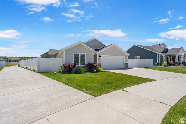 641 E Green Springs Way Unit 324, South Weber, UT 84405 - view of front of house with concrete driveway, a garage, and stone siding