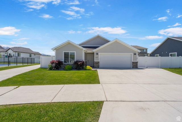 641 E Green Springs Way Unit 324, South Weber, UT 84405 - craftsman-style home with an attached garage, driveway, and stone siding