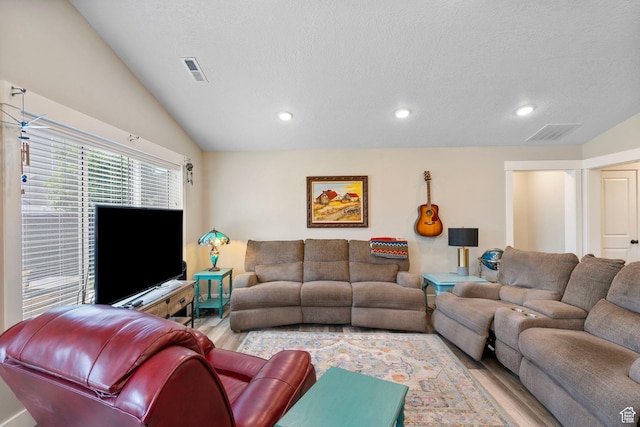 641 E Green Springs Way Unit 324, South Weber, UT 84405 - living area featuring vaulted ceiling, recessed lighting, wood finished floors, and a textured ceiling