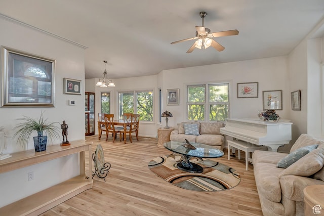 3286 N Piute Dr, Provo, UT 84604 - living room with a chandelier, light wood-style floors, and a ceiling fan