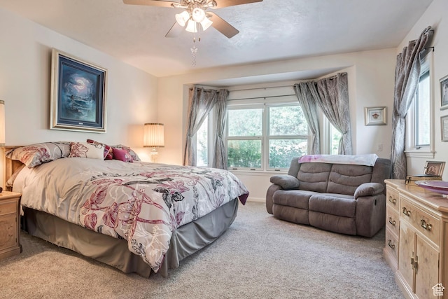 3286 N Piute Dr, Provo, UT 84604 - bedroom with light colored carpet, a ceiling fan, and baseboards