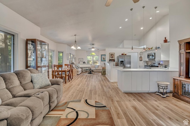 3286 N Piute Dr, Provo, UT 84604 - living area featuring ceiling fan, light wood-type flooring, recessed lighting, and a chandelier
