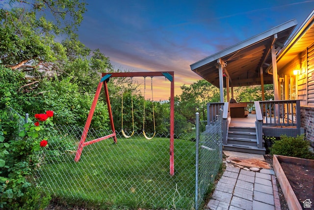 3286 N Piute Dr, Provo, UT 84604 - yard at dusk featuring a deck