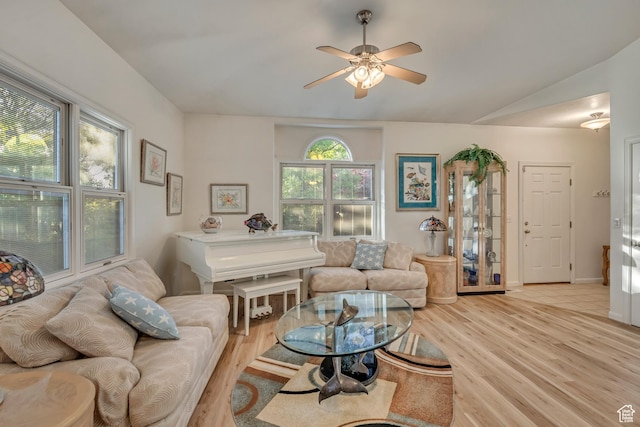 3286 N Piute Dr, Provo, UT 84604 - living area with light wood finished floors, a ceiling fan, and vaulted ceiling