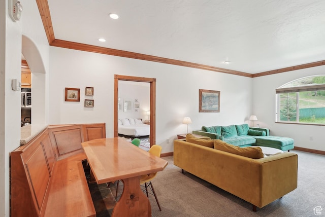 840 Bigler Ln Unit 2021, Midway, UT 84049 - living room featuring ornamental molding, light colored carpet, baseboards, arched walkways, and recessed lighting