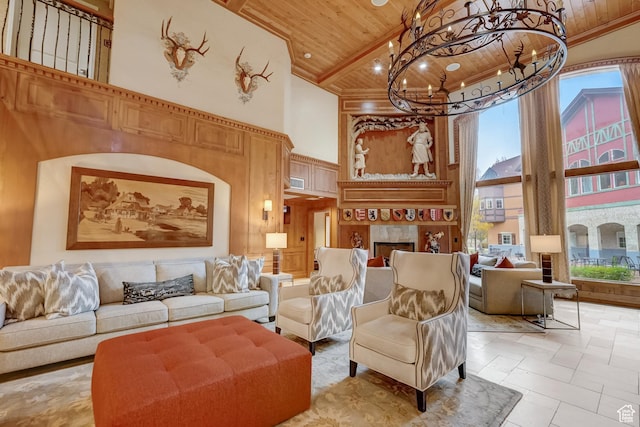 840 Bigler Ln Unit 2021, Midway, UT 84049 - living area featuring wooden ceiling with exposed beams, a towering ceiling, a chandelier, and a high end fireplace