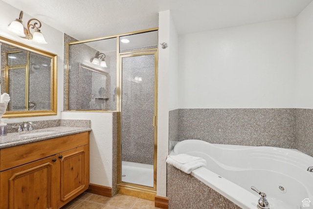 840 Bigler Ln Unit 2021, Midway, UT 84049 - bathroom featuring a shower stall, tile patterned floors, a whirlpool tub, and vanity