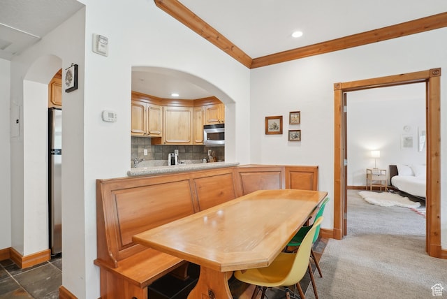 840 Bigler Ln Unit 2021, Midway, UT 84049 - dining room featuring arched walkways, baseboards, electric panel, recessed lighting, and crown molding