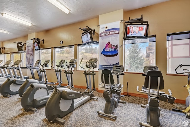 840 Bigler Ln Unit 2021, Midway, UT 84049 - gym featuring carpet flooring, baseboards, and a textured ceiling