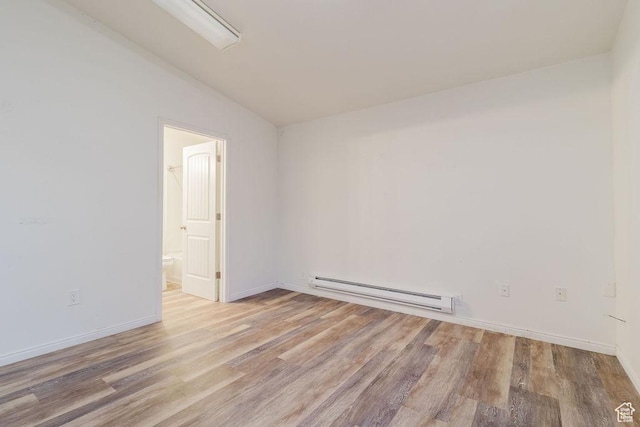 171 E 200 N, Orem, UT 84057 - unfurnished room featuring baseboard heating, wood finished floors, and baseboards