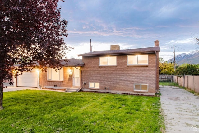 171 E 200 N, Orem, UT 84057 - view of front of property with brick siding, driveway, and a chimney