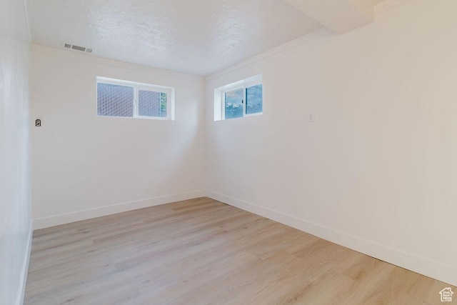 171 E 200 N, Orem, UT 84057 - spare room featuring ornamental molding, light wood-type flooring, and baseboards