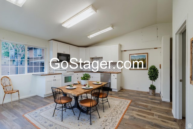 171 E 200 N, Orem, UT 84057 - dining area with vaulted ceiling and dark wood-type flooring