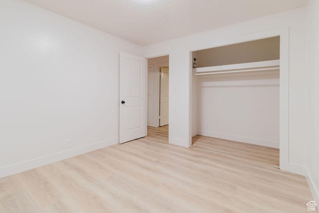 171 E 200 N, Orem, UT 84057 - unfurnished bedroom featuring wood finished floors, baseboards, and a closet
