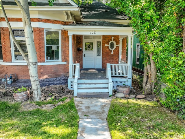 532 E 600 S, Salt Lake City, UT 84102 - property entrance featuring brick siding and a porch