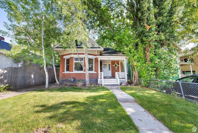 532 E 600 S, Salt Lake City, UT 84102 - bungalow-style house featuring a porch and brick siding