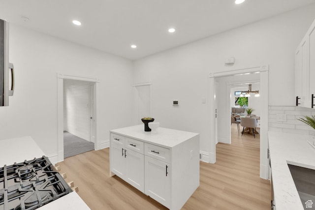 532 E 600 S, Salt Lake City, UT 84102 - kitchen featuring light wood-style floors, white cabinets, black cooktop, and recessed lighting