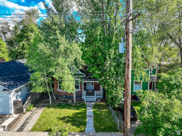 532 E 600 S, Salt Lake City, UT 84102 - view of property hidden behind natural elements featuring a front yard and brick siding