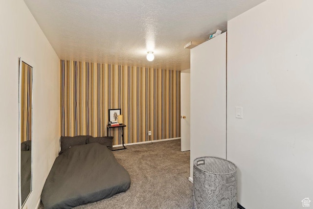 1162 S 885 E, Ogden, UT 84404 - carpeted bedroom featuring a textured ceiling and wallpapered walls