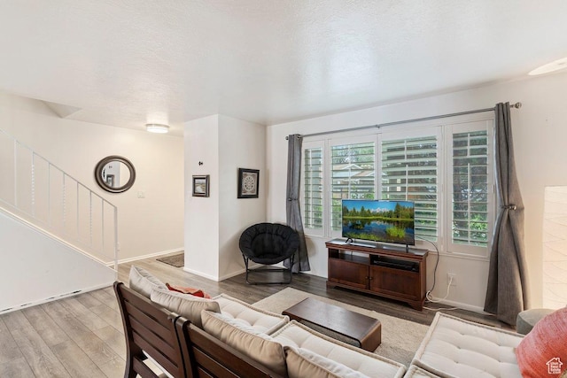 1162 S 885 E, Ogden, UT 84404 - living area featuring wood finished floors and baseboards