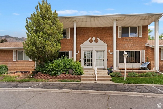 1162 S 885 E, Ogden, UT 84404 - greek revival inspired property featuring brick siding and a porch