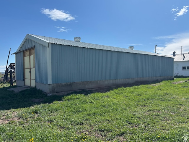 149 Thomas Fork Ln, Geneva, ID 83238 - view of property exterior featuring a yard, an outbuilding, a pole building, and metal roof
