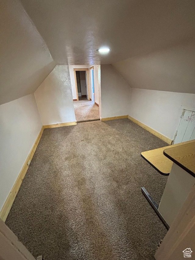 149 Thomas Fork Ln, Geneva, ID 83238 - bonus room featuring vaulted ceiling, carpet floors, and baseboards