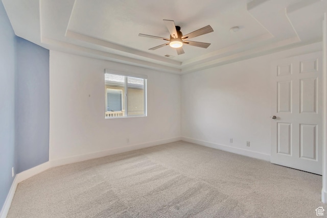 4917 W Stormy Meadow Dr, Riverton, UT 84096 - unfurnished room with a raised ceiling, a ceiling fan, light colored carpet, and baseboards