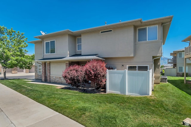 4917 W Stormy Meadow Dr, Riverton, UT 84096 - back of house with stucco siding and stone siding