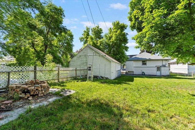 73 E 400 S, Logan, UT 84321 - view of yard featuring an outbuilding