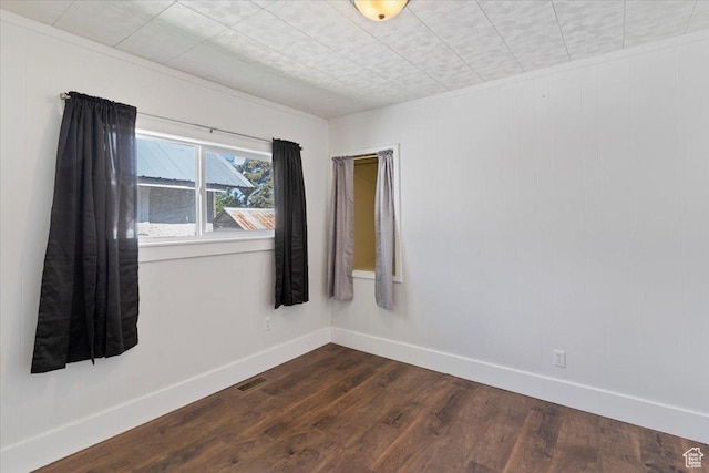 73 E 400 S, Logan, UT 84321 - spare room with dark wood finished floors, baseboards, and crown molding