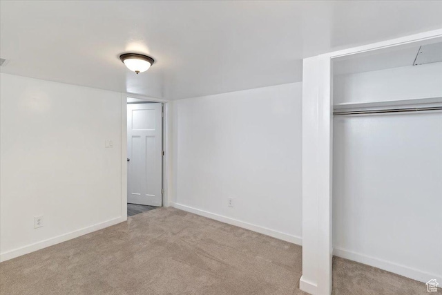 73 E 400 S, Logan, UT 84321 - unfurnished bedroom featuring carpet flooring, a closet, and baseboards