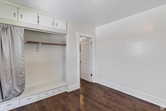 73 E 400 S, Logan, UT 84321 - unfurnished bedroom with dark wood finished floors, baseboards, and a closet