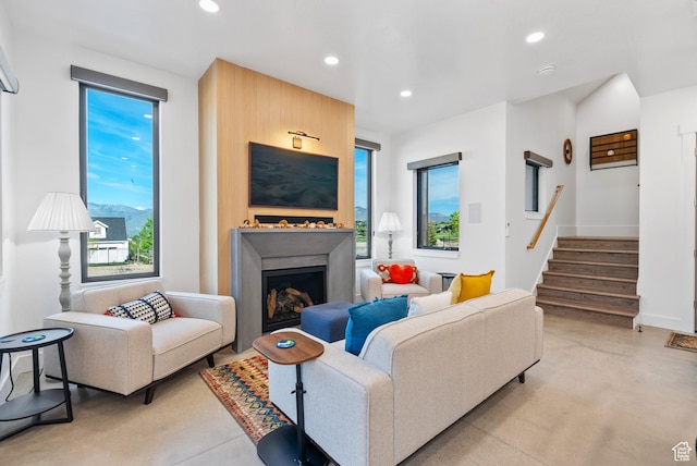 2508 E 70 S Unit 4, Heber City, UT 84032 - living area with recessed lighting, a fireplace, stairway, concrete floors, and baseboards